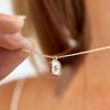 BaubleBar Initial Necklace – Dainty Gold-Plated Personalized Letter Pendant Necklace, Small Dog Tag Style Design(Mother of Pearl)