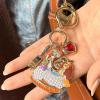 BaubleBar x Disney Dynamic Duo Bag Charm – Perfect for Accessorizing Your Purse or Backpack – Disney Lover Gifts for All Ages(Lady and the Tramp)