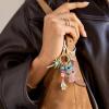 BaubleBar x Disney Dynamic Duo Bag Charm – Perfect for Accessorizing Your Purse or Backpack – Disney Lover Gifts for All Ages(Stitch & Angel)