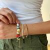 BaubleBar x Disney Friends Forever Charm Bracelet – Pull Tie Bracelet with Chunky Beads, Disney Characters Fashion Jewelry, Stackable and Stylish Accessories for Women(Peanuts)